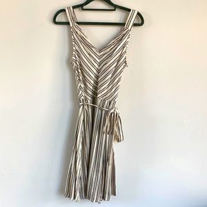 Brand New! Stripped sleeveless V-neck dress with belt. Mid length with tags